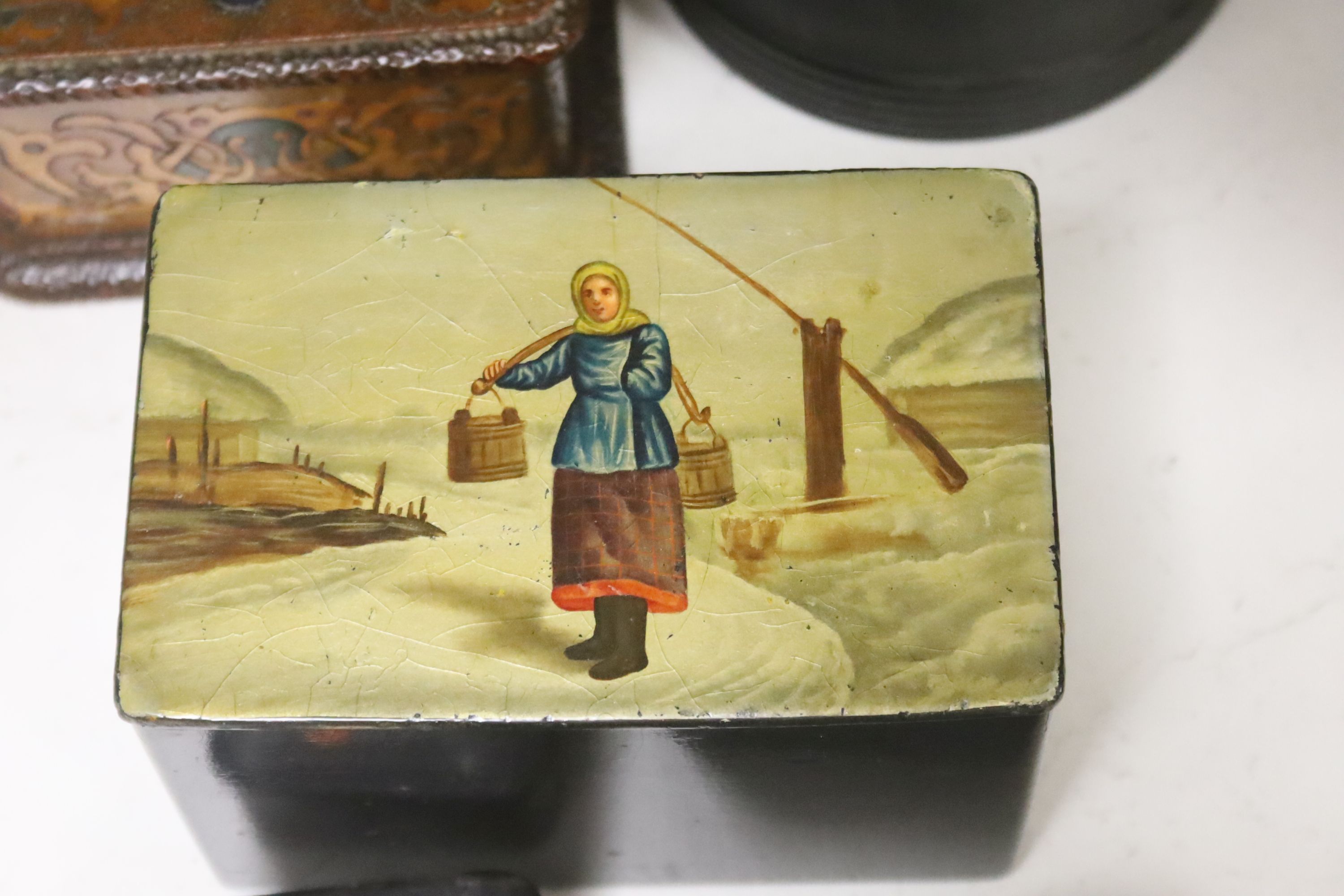 A collection of six Russian and European lacquer boxes, largest 14 x 9cm 9cm high, together with a papier mache snuff box and another decorative box (8)